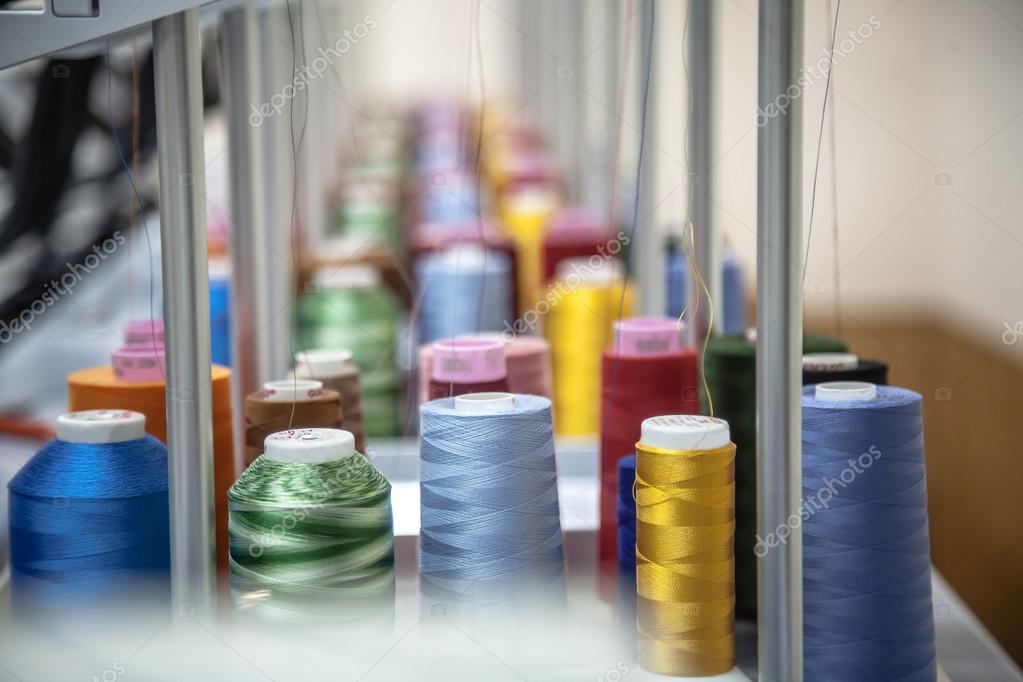 depositphotos 37014207 stock photo colorful reels of threads background